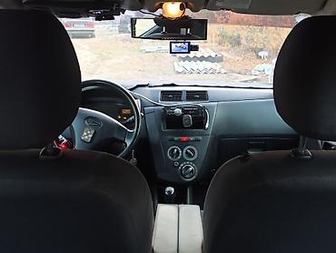 мото 300: Daihatsu Cuore: 2008 г., 1 л, Механика, Бензин, Хэтчбэк — 6
