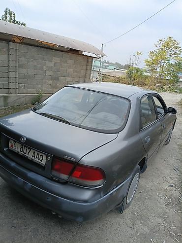210 cdi: Mazda 626: 1992 г., Механика, Седан — 3