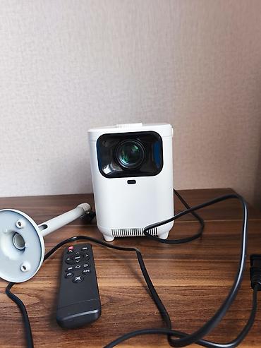 Proyektorlar: Portativ Proyektor – BT 5.0 & Wi‑Fi Əsas xüsusiyyətlər: - Ev — 3