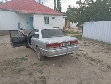 дом на колосах: Mazda 626: 1987 г., 2 л, Механика, Бензин
