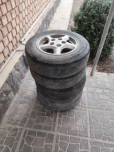 Шины и диски: Комплект из 4 колес Toyota: литые диски + шины 185/70 R14 88H — 2