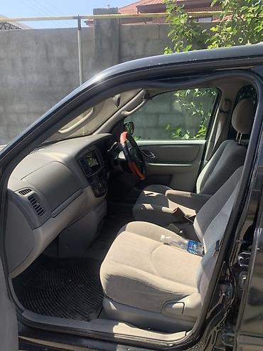 на кару: Mazda Tribute: 2000 г., 3 л, Автомат, Бензин, Кроссовер — 5