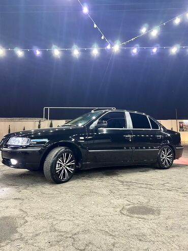 Digər Avtomobillər: Maşın: Qara rəngli sedan Xüsusiyyətlər: - Korpus: 4 qapılı sedan — 9