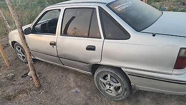 Daewoo Nexia: 2005 г., Кол менен иштөөчү, Бензин, Седан — 5