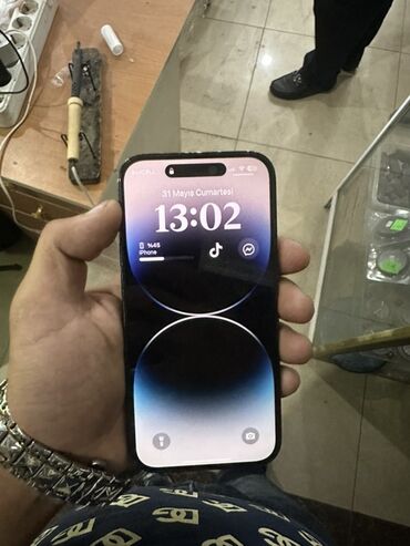 ən ucuz iphone: IPhone 14 Pro, Qara, Face ID