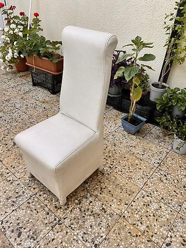 bayraq dirəyi: Ağ rəngli, yüksək arxalı yemək/oturma otağı stulu. Xüsusiyyətlər: - — 2