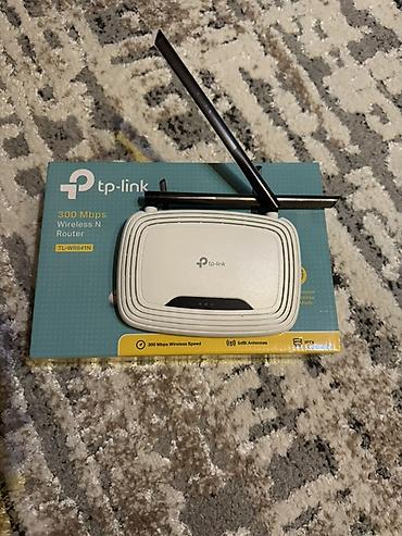 modem satilir: TP-Link TL-WR841N – 300 Mbps Wireless N router - Sürət: 2.4 GHz — 2