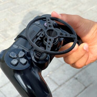 диски плейстейшен 2: Черный мини рyль для геймпада dualshock 4 новый, пользовался меньше