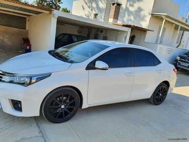 Toyota: Toyota Corolla: 1.4 l. | 2015 έ. Sedan — 2