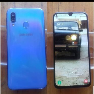 Samsung Galaxy A40, 64 ГБ, цвет - Голубой, Две SIM карты, Face ID, Кнопочный