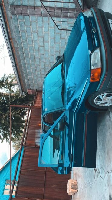 купить чехол для авто в бишкеке: Ford Escort: 1992 г., 1.4 л, Механика, Бензин, Хэтчбэк
