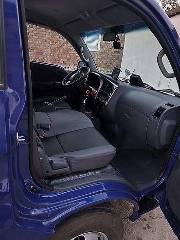 борта: KIA Bongo (K2500/K2700) бортовой малотоннажный грузовик, синий цвет — 4