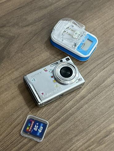 sony kamera: Цифровой фотоаппарат Sony Cyber‑shot (серебристый) + карта памяти SD 4 — 1