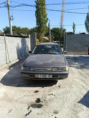 электро гелик китай: Mazda 626: 1991 г., 2 л, Механика, Бензин, Универсал — 1