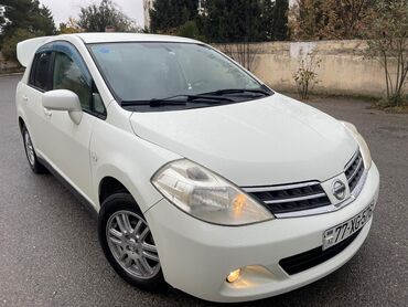 Nissan: Nissan Tiida: 1.5 l | 2011 il Sedan