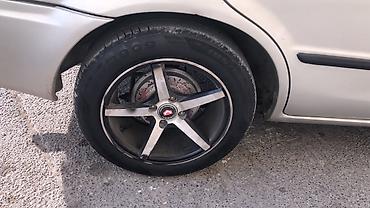 f10 diskleri: R 15 4 bolt diskler sayılır ve ya barter edilir 480 azn — 2