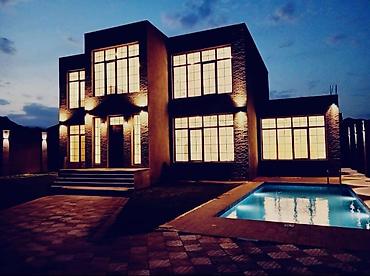 Həyət evləri və villaların satışı: Müasir memarlığa malik iki mərtəbəli villa. Geniş panoram pəncərələr — 1