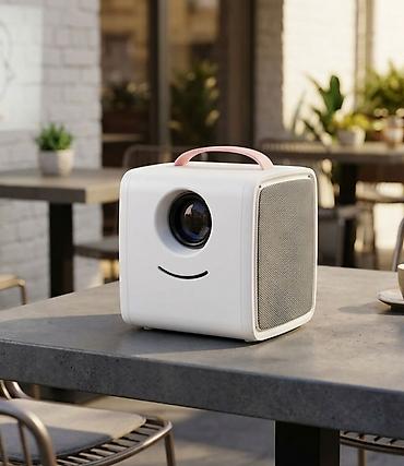 ayfon 17 pro maks: Kompakt portativ projektor - Dizayn: Kvadrat formalı, ağ korpus — 1