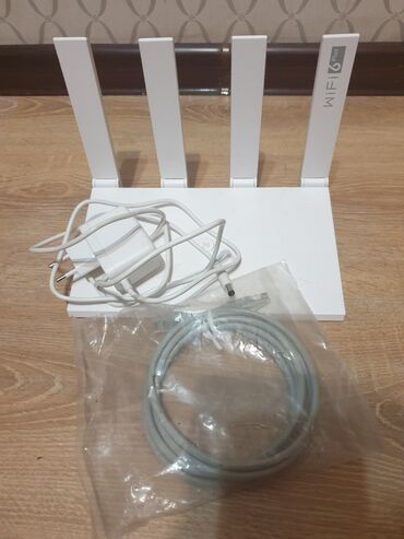 роутер ошка цена: Белый маршрутизатор с поддержкой стандарта Wi-Fi 6, оснащенный
