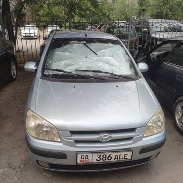 худай гетис: Hyundai Getz, компактный автомобиль серебристого цвета. Этот хэтчбек