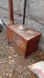 мальберт для рисования: Металлическая дровяная печь-буржуйка с варочной поверхностью