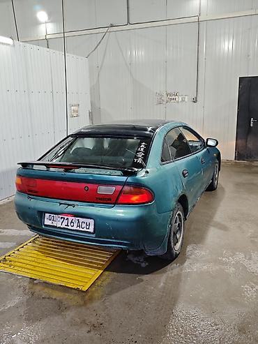 Унаа сатуу: Mazda 323: 1996 г., 1.5 л, Кол менен иштөөчү, Бензин, Хетчбек — 2