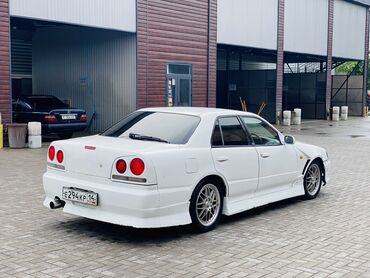 машина япошки: Nissan Skyline: 1999 г., 2.5 л, Автомат, Бензин, Седан