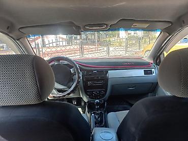 с номерами: Chevrolet Lacetti: 2009 г., 1.6 л, Механика, Бензин, Седан — 4