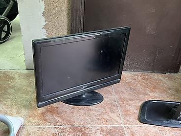 Телевизор LG с диагональю ориентировочно 22–24". Особенности: -