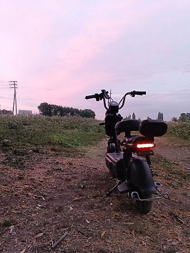 двух скатт: Электроскутер iBIKE. - Компоновка: удлиненная платформа с двумя — 3