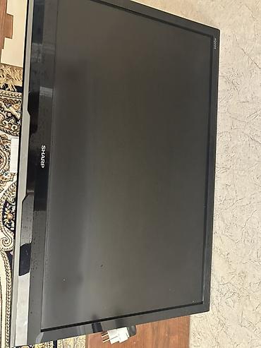 jack 4: Телевизор Sharp AQUOS, диагональ около 32" (80 см). Плоская ЖК‑панель — 3