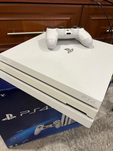 купить сони плейстейшен 2: Sony PlayStation 4 Pro, цвет Glacier White. Полная версия консоли с