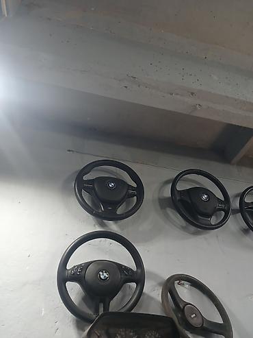 logitech sükan: BMW sükanları Şəkildə BMW markalı bir neçə sükan görünür. Müxtəlif — 1
