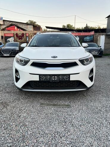 привозные моторы на ауди бишкек: Компактный кроссовер Kia Stonic белого цвета, оснащенный рейлингами на