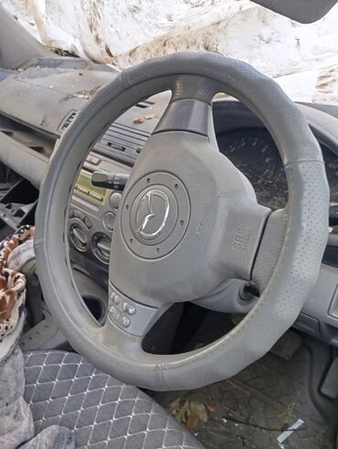 блокиратор рулевого вала: Руль Mazda