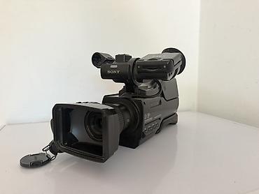 Видеокамеры: Плечевая видеокамера Sony (линейка Handycam/HD), с профессиональным — 1
