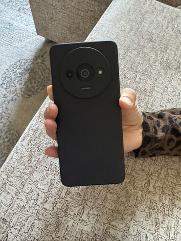 флай 2000 телефон: Смартфон на Android с большим экраном и круговым блоком камер