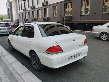 tayota runx: Mitsubishi Lancer: 2002 г., 1.6 л, Автомат, Бензин