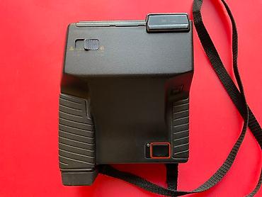 kingdom come: Polaroid 600 İmpulse- fotokamerası. İstehsalçı ölkə: United Kingdom. 1 — 4