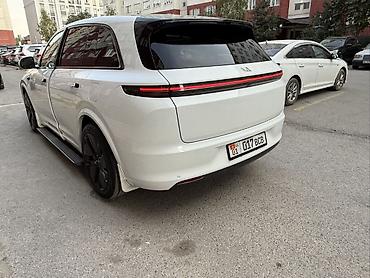 wuling mini ev: Lixiang L7: 2023 г., 1.5 л, Автомат, Гибрид, Кроссовер — 2