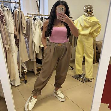 Pantalone: ✅Ženske široke pantalone sa karnerima na nogavicama i kaišem
✅2400 din — 10