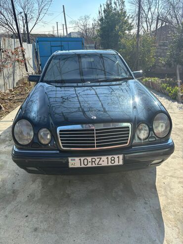 Mercedes-Benz: Mercedes-Benz E-Class: 2.4 l | 1998 il Sedan — 9