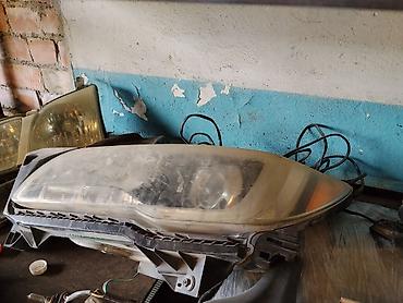 led h4: Левая передняя фара для автомобиля. Галогенная оптика в сборе: корпус — 2