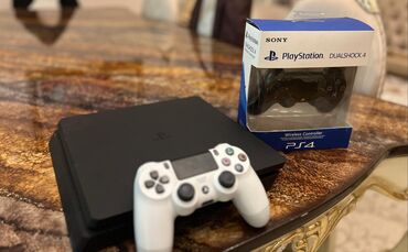 slim diet baku: Play station 4 slim 1tb yaddas 2 pult ile birlikde şnurlari hamisi var