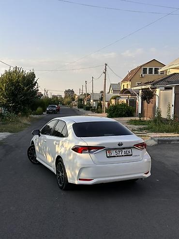 byd e2: Toyota Corolla: 2022 г., 1.8 л, Автомат, Гибрид, Седан — 2