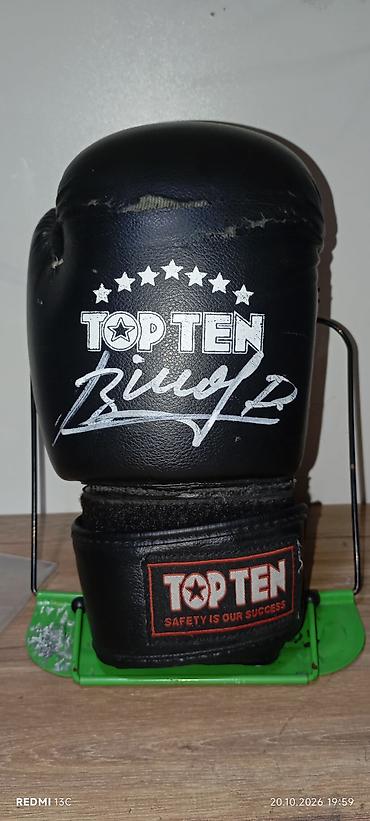 фудбольный поля: 🥊 Боксёрские перчатки TOP TEN с автографом Дмитрия Бивола Оригинальные — 1