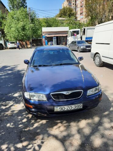 opel omega satilir: Mazda XEDOS 9: 2.5 л | 1997 г. Седан