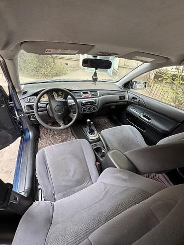 митсубиси делка: Mitsubishi Lancer: 2004 г., 1.8 л, Механика, Бензин, Седан — 9