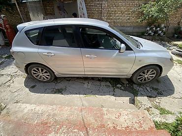 bud e9: Mazda 3: 2004 г., 2 л, Механика, Бензин, Хэтчбэк — 2