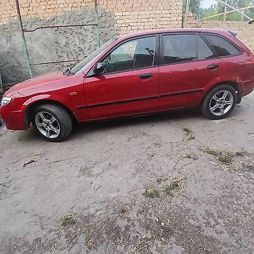 мазда фамили: Mazda 323: 2003 г., 1.5 л, Механика, Бензин, Хэтчбэк — 1